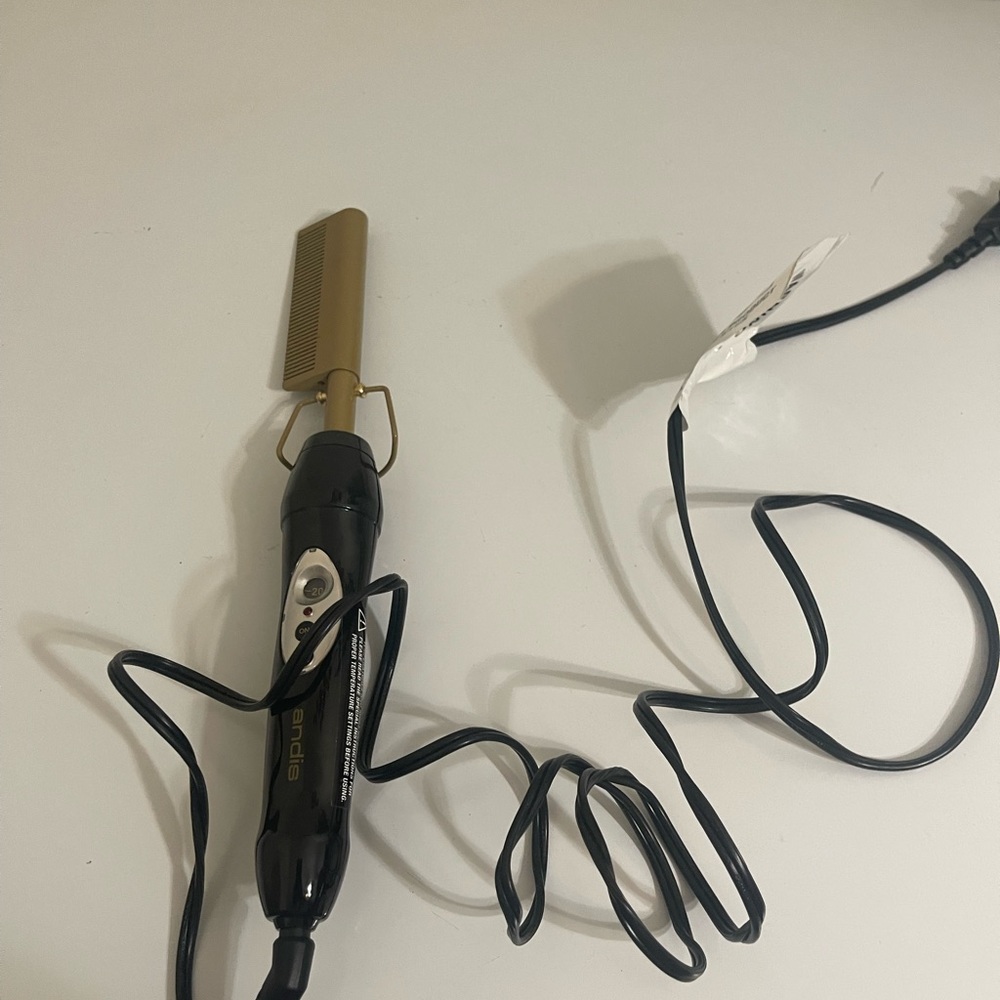 Electric pressing comb